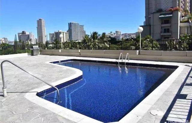 1850 Ala Moana Blvd Unit 223, Honolulu, HI 96815 - community pool with a skyline view and a patio