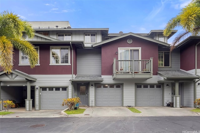 7012 Hawaii Kai Dr Unit 904, Honolulu, HI 96825 - view of property with a balcony, an attached garage, and driveway
