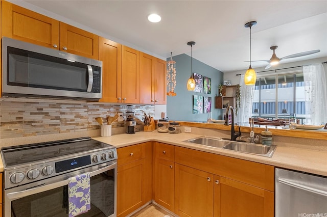 7012 Hawaii Kai Dr Unit 904, Honolulu, HI 96825 - kitchen with stainless steel appliances, a sink, light countertops, tasteful backsplash, and decorative light fixtures