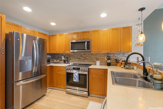 7012 Hawaii Kai Dr Unit 904, Honolulu, HI 96825 - kitchen with stainless steel appliances, a sink, light countertops, decorative backsplash, and recessed lighting