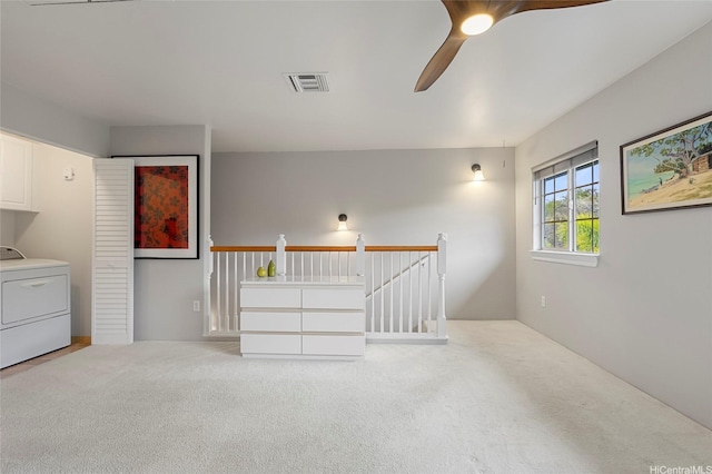 7012 Hawaii Kai Dr Unit 904, Honolulu, HI 96825 - carpeted spare room featuring washer / dryer and ceiling fan
