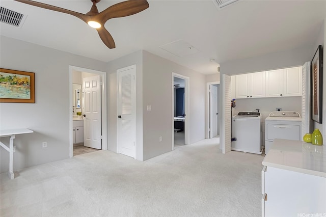 7012 Hawaii Kai Dr Unit 904, Honolulu, HI 96825 - laundry room featuring cabinet space, separate washer and dryer, light colored carpet, and attic access