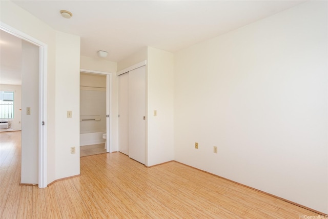 95-1025 Kaapeha St Unit 203, Mililani, HI 96789 - unfurnished bedroom with light wood-type flooring and a closet