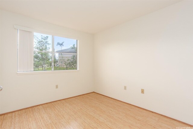 95-1025 Kaapeha St Unit 203, Mililani, HI 96789 - spare room with wood finished floors and baseboards