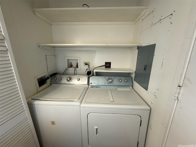 1717 Ala Wai Blvd Unit 306, Honolulu, HI 96815 - laundry area with washer and dryer and electric panel