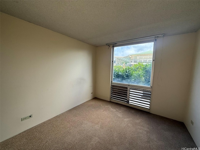 1717 Ala Wai Blvd Unit 306, Honolulu, HI 96815 - empty room with carpet flooring and a textured ceiling