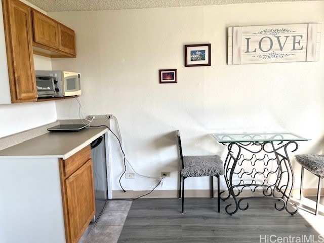 444 Niu St Unit 1312, Honolulu, HI 96815 - dining area featuring wood finished floors and baseboards