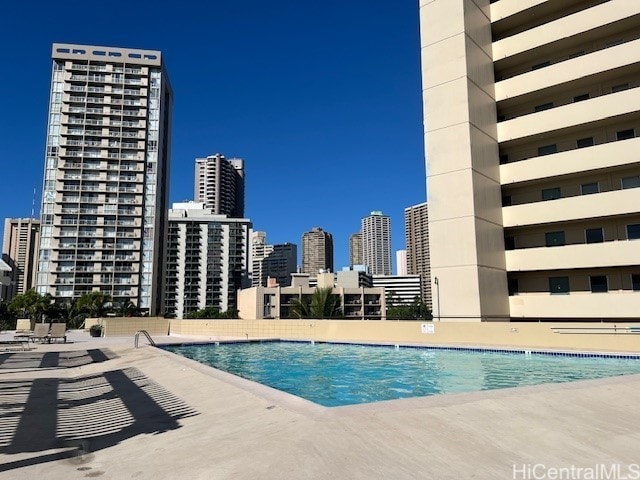 444 Niu St Unit 1312, Honolulu, HI 96815 - community pool with a skyline view