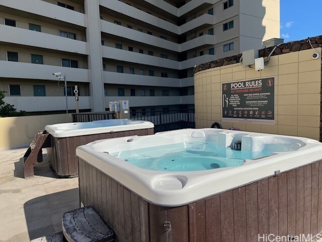 444 Niu St Unit 1312, Honolulu, HI 96815 - view of swimming pool with a hot tub
