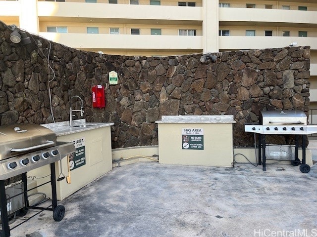 444 Niu St Unit 1312, Honolulu, HI 96815 - view of patio featuring grilling area and a sink