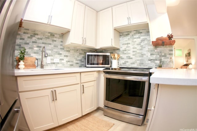 3823 Lower Honoapiilani Rd Unit 105, Lahaina, HI 96761 - kitchen with appliances with stainless steel finishes, a sink, and light countertops