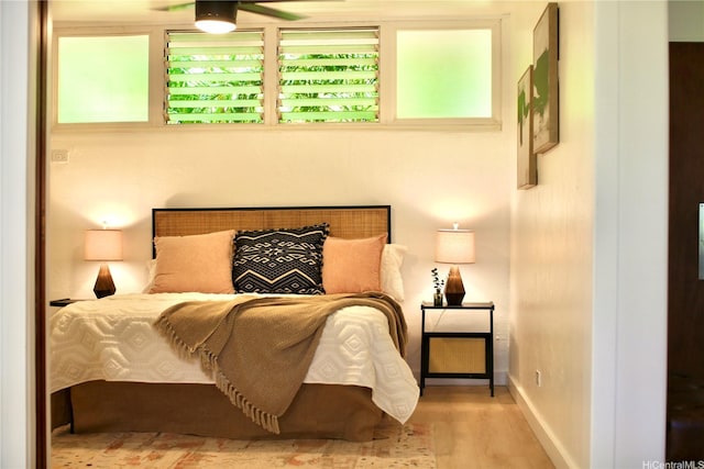 3823 Lower Honoapiilani Rd Unit 105, Lahaina, HI 96761 - bedroom featuring wood finished floors and baseboards