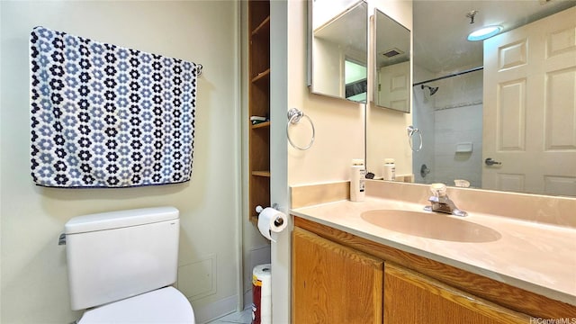 2040 Nuuanu Ave Unit 404, Honolulu, HI 96817 - bathroom with toilet, vanity, and a shower
