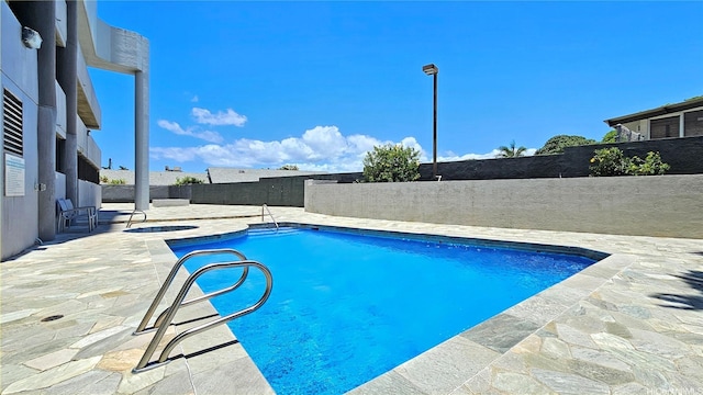 2040 Nuuanu Ave Unit 404, Honolulu, HI 96817 - view of pool featuring a fenced backyard and a patio area