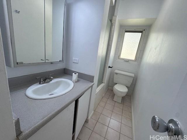 303 Liliuokalani Ave Unit 602, Honolulu, HI 96815 - bathroom featuring tile patterned floors, vanity, and toilet