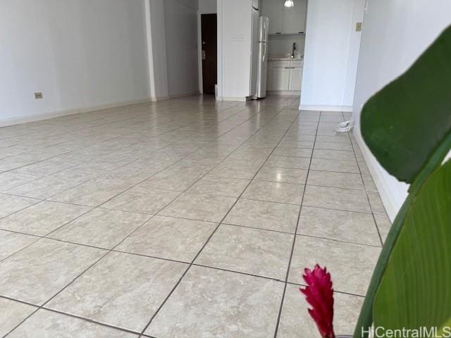 303 Liliuokalani Ave Unit 602, Honolulu, HI 96815 - unfurnished room featuring light tile patterned floors and baseboards