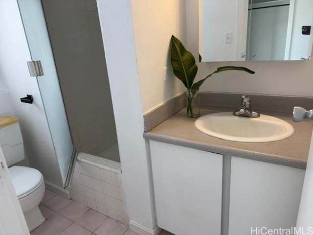 303 Liliuokalani Ave Unit 602, Honolulu, HI 96815 - full bathroom featuring a shower stall, vanity, and tile patterned flooring
