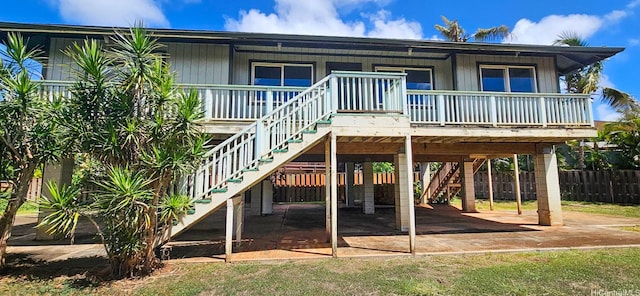 67-213 Niumaloo Pl, Waialua, HI 96791 - back of property featuring stairs, a carport, and a porch