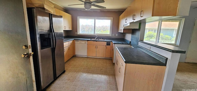 67-213 Niumaloo Pl, Waialua, HI 96791 - kitchen with white dishwasher, stainless steel refrigerator with ice dispenser, a sink, ceiling fan, and dark countertops