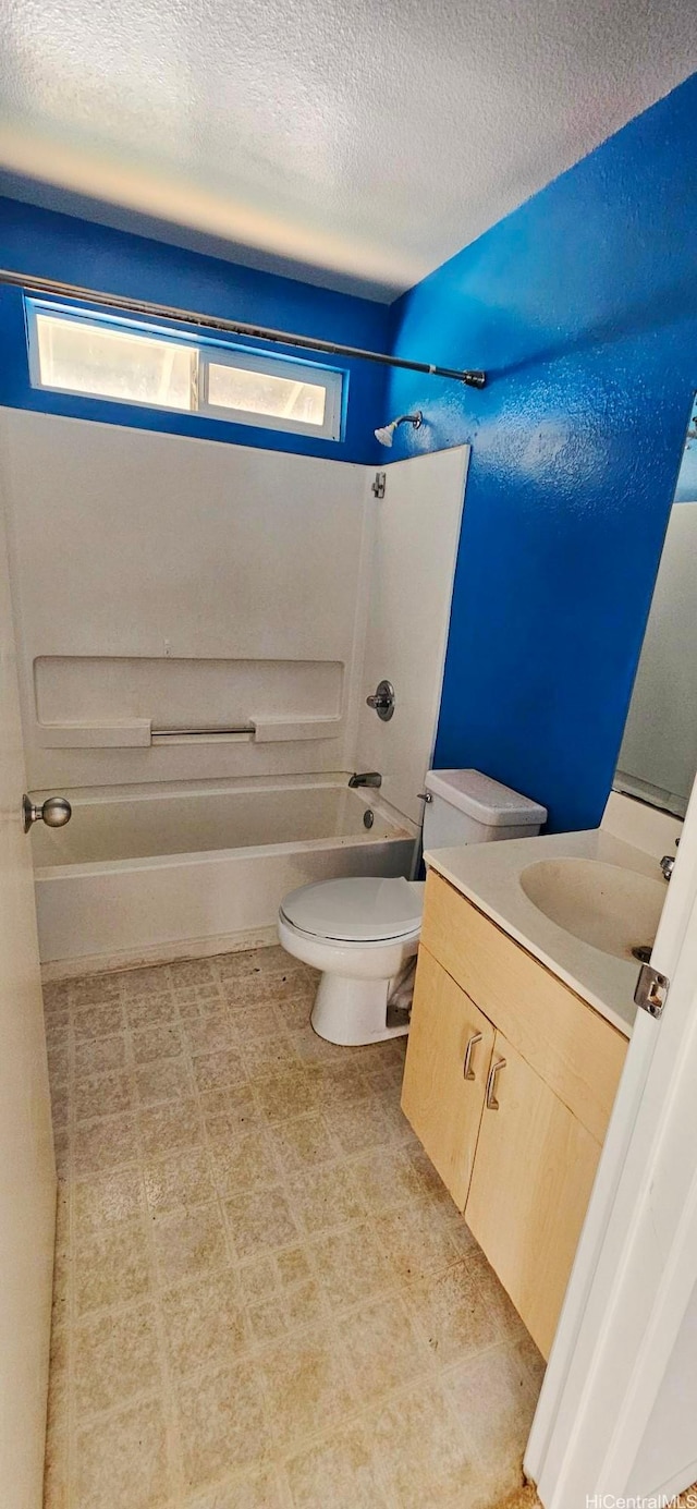 67-213 Niumaloo Pl, Waialua, HI 96791 - bathroom with vanity, shower / washtub combination, toilet, and a textured ceiling
