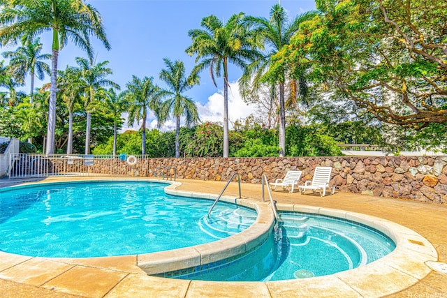 98-1040 Moanalua Rd Unit 1-201, Aiea, HI 96701 - view of swimming pool featuring a pool with connected hot tub