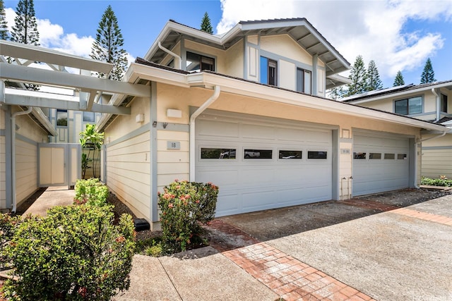95-280 Ualalehu St Unit 18, Mililani, HI 96789 - townhome / multi-family property with asphalt driveway and stucco siding