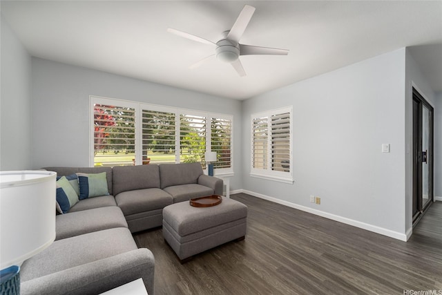 95-280 Ualalehu St Unit 18, Mililani, HI 96789 - living area with dark wood-type flooring, baseboards, and a ceiling fan