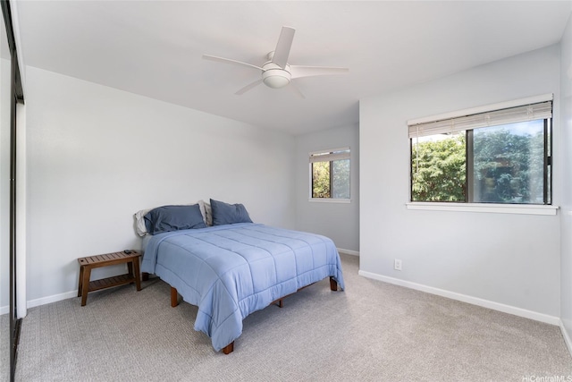 95-280 Ualalehu St Unit 18, Mililani, HI 96789 - bedroom featuring light colored carpet, baseboards, and a ceiling fan