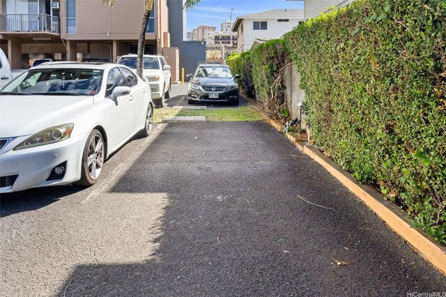 1050 Kinau St Unit 301, Honolulu, HI 96814 - view of uncovered parking lot