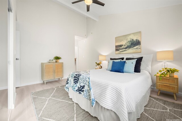 355 Aoloa St Unit D203, Kailua, HI 96734 - bedroom featuring beamed ceiling, wood finished floors, a ceiling fan, baseboards, and high vaulted ceiling