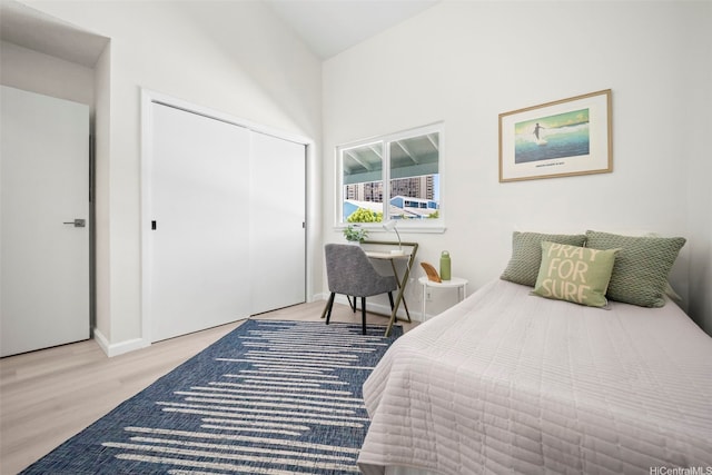 355 Aoloa St Unit D203, Kailua, HI 96734 - bedroom featuring wood finished floors, a closet, and baseboards