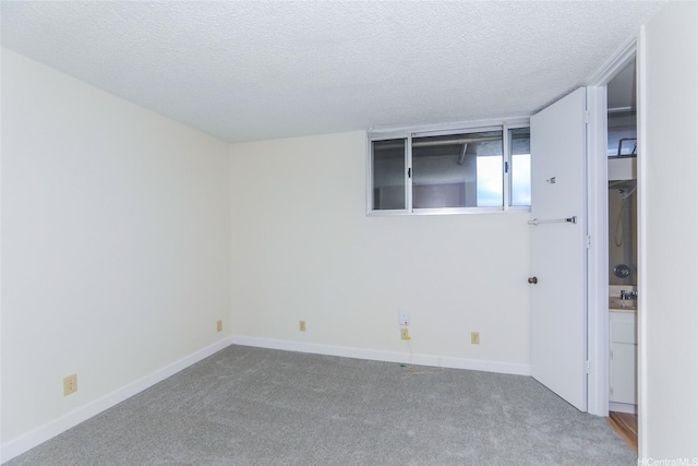 2916 Date St Unit 10I, Honolulu, HI 96816 - carpeted empty room with a textured ceiling and baseboards