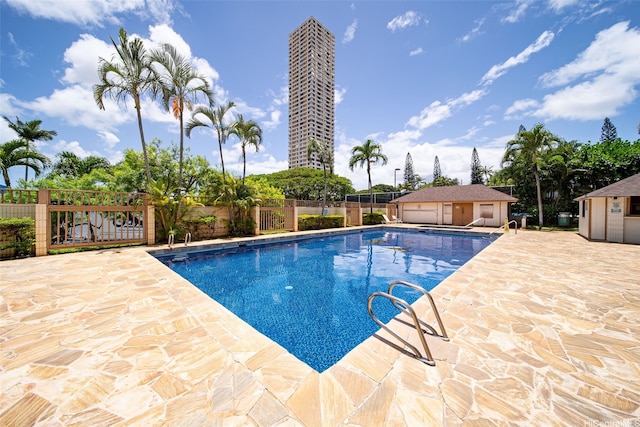 1060 Kamehameha Hwy Unit 4204A, Pearl City, HI 96782 - view of swimming pool with a patio area and an outdoor structure