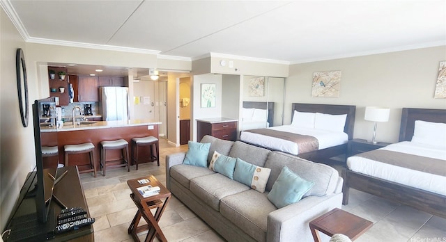 1777 Ala Moana Blvd Unit 1506, Honolulu, HI 96815 - bedroom featuring freestanding refrigerator, ornamental molding, and a sink