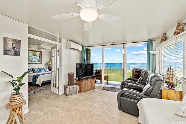 87-561 Farrington Hwy Unit 102, Waianae, HI 96792 - living area with ceiling fan, healthy amount of natural light, and a wall mounted AC