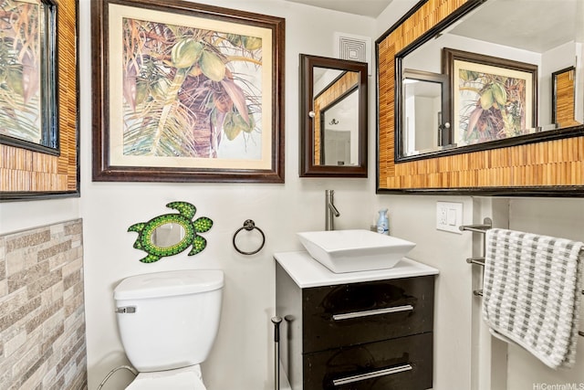 87-561 Farrington Hwy Unit 102, Waianae, HI 96792 - half bathroom featuring toilet and vanity