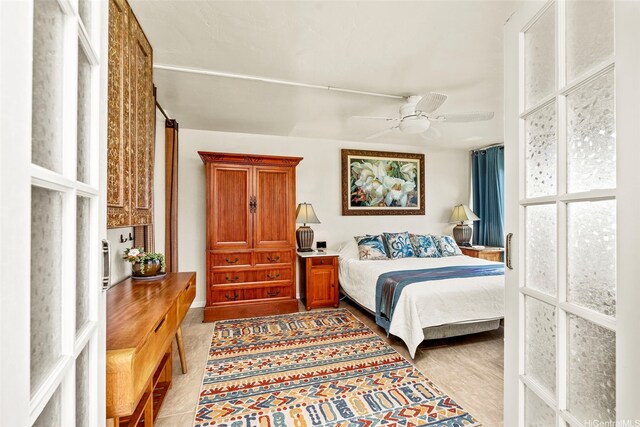 87-561 Farrington Hwy Unit 102, Waianae, HI 96792 - bedroom featuring ceiling fan