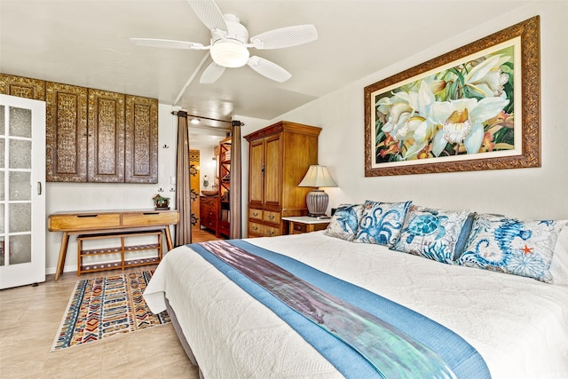 87-561 Farrington Hwy Unit 102, Waianae, HI 96792 - bedroom featuring a ceiling fan and light tile patterned floors