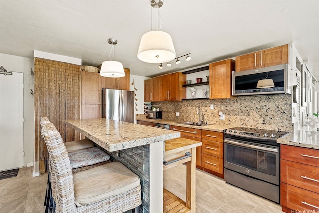 87-561 Farrington Hwy Unit 102, Waianae, HI 96792 - kitchen with appliances with stainless steel finishes, a sink, open shelves, brown cabinets, and backsplash