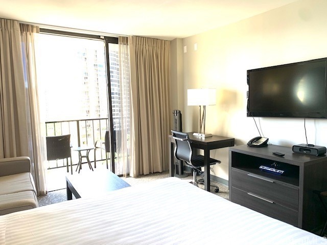 1850 Ala Moana Blvd Unit 819, Honolulu, HI 96815 - carpeted bedroom featuring floor to ceiling windows
