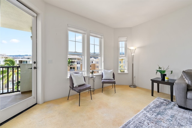 520 Lunalilo Home Rd Unit 7411, Honolulu, HI 96825 - living area featuring healthy amount of natural light and carpet floors