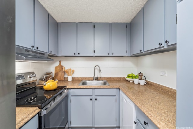502 Captain Cook Ave Unit 301, Honolulu, HI 96813 - kitchen with electric range, a sink, under cabinet range hood, a textured ceiling, and decorative backsplash
