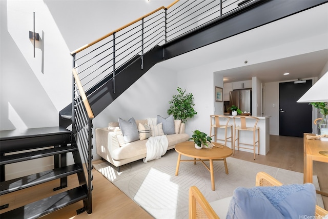 545 Queen St Unit 628, Honolulu, HI 96813 - living area featuring stairs and wood finished floors