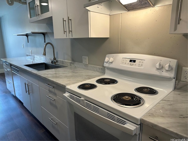 803 Waimanu St Unit 109, Honolulu, HI 96813 - kitchen featuring electric range, a sink, dark wood-style flooring, and glass insert cabinets