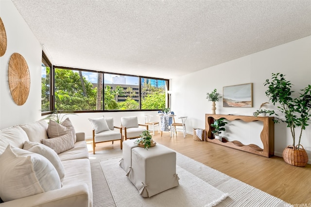 55 S Kukui St Unit D214, Honolulu, HI 96813 - living area with a textured ceiling and wood finished floors