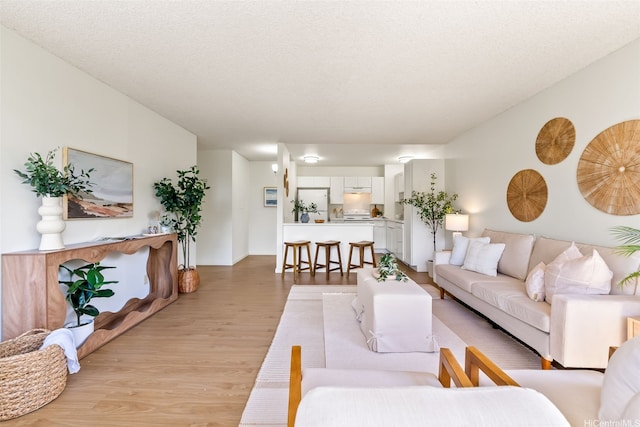 55 S Kukui St Unit D214, Honolulu, HI 96813 - living room featuring light wood-style flooring