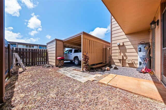 94-402 Kapuahi St Unit 46, Mililani, HI 96789 - view of parking / parking lot with water heater