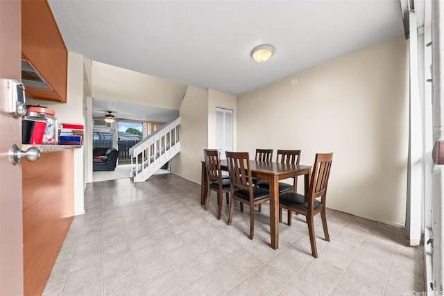 94-402 Kapuahi St Unit 46, Mililani, HI 96789 - dining area featuring a ceiling fan and stairway