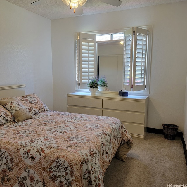 95-1050 Makaikai St Unit 16C, Mililani, HI 96789 - carpeted bedroom featuring a ceiling fan