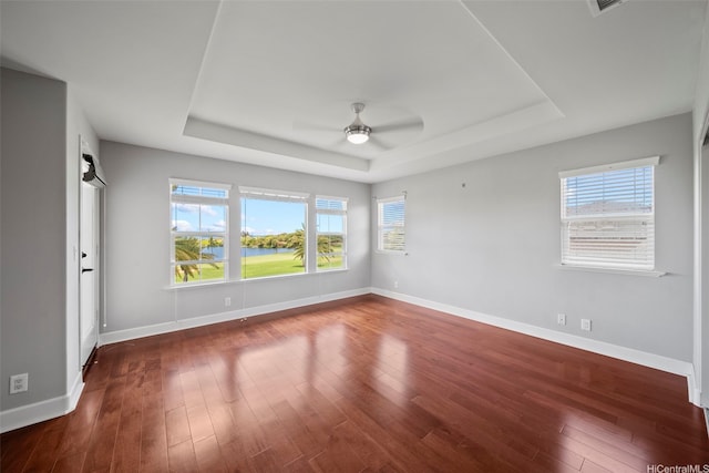91-1304 Kaikohola St Unit D41, Ewa Beach, HI 96706 - unfurnished room with a tray ceiling, a ceiling fan, plenty of natural light, and baseboards